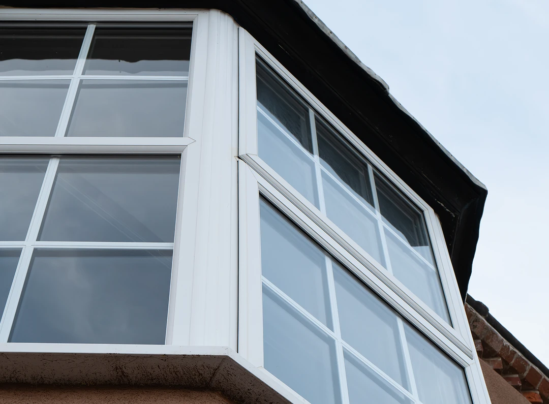 Bay window with white frames and glass.